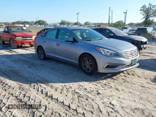 2015 Hyundai Sonata SE z VIN 5NPE24AF0FH196513, wystawiony jako IAAI lot #41476826 z przebiegiem 162 614 mil mil oraz . Historia ofert i sprzedaży dostępna na DreamBid. Obrazek 1.