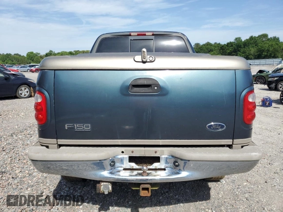 2001 Ford F-150 XLT z VIN 1FTRW08L21KB37421, wystawiony jako Copart lot #57114015 z przebiegiem 288 942 mil mil oraz Szkoda całkowita • Salvage title. Historia ofert i sprzedaży dostępna na DreamBid. Obrazek 6.