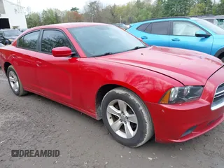 2014 Dodge Charger SE with VIN 2C3CDXBG6EH172058, listed as a IAAI auction lot 42227390 with 174,148 mi miles and . Bid and sale history available at carsss.com. Image 1.