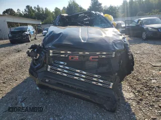 2023 GMC Canyon 4WD Denali with VIN 1GTP6FEK6P1263009, listed as a Copart auction lot 71101004 with 0 mi miles and Salvage Title. Bid and sale history available at carsss.com. Image 5.