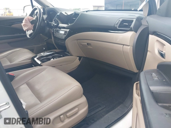 2020 Honda Pilot Elite with VIN 5FNYF6H08LB014288, listed as a IAAI auction lot 40496871 with 57,921 mi miles and . Bid and sale history available at DreamBid. Image 5.
