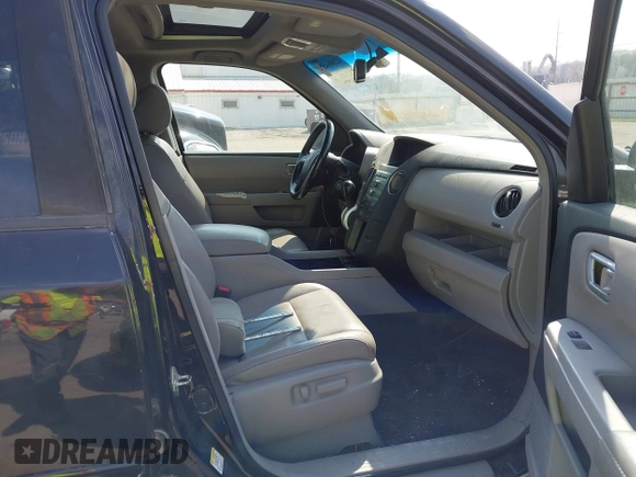 2009 Honda Pilot EX-L with VIN 5FNYF48529B035128, listed as a IAAI auction lot 42006450 with 214,069 mi miles. Bid and sale history available at carsss.com. Image 5.