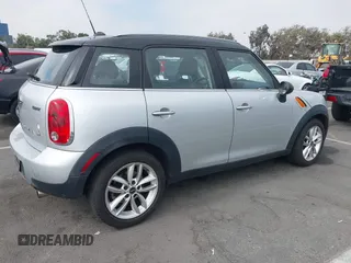 2013 MINI Countryman with VIN WMWZB3C5XDWM09519, listed as a IAAI auction lot 42665715 with 127,891 mi miles and . Bid and sale history available at DreamBid. Image 4.