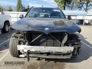2021 BMW X5 xDrive45e with VIN 5UXTA6C03M9H56515, listed as a Copart auction lot 45798715 with 59,156 mi miles and Salvage Title. Bid and sale history available at carsss.com. Image 5.