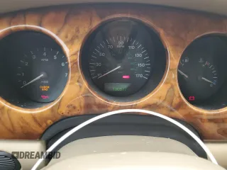 1999 Jaguar XJ with VIN SAJHX1040XC864208, listed as a Copart auction lot 59748585 with 130,577 mi miles and Clean title. Bid and sale history available at DreamBid. Image 9.