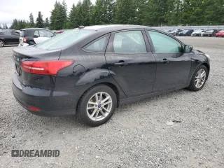 2018 Ford Focus SE z VIN 1FADP3FEXJL288116, wystawiony jako Copart lot #59629655 z przebiegiem 105 461 mil mil oraz Czysty tytuł • Clean title. Historia ofert i sprzedaży dostępna na DreamBid. Obrazek 3.