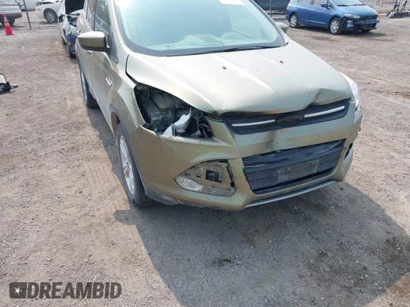 2013 Ford Escape SE z VIN 1FMCU9GX4DUC68312, wystawiony jako IAAI lot #42472030 z przebiegiem 134 070 mil mil oraz . Historia ofert i sprzedaży dostępna na DreamBid. Obrazek 6.