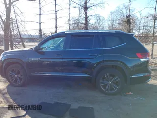 2022 Volkswagen Atlas SEL R-Line z VIN 1V2AR2CA9NC505811, wystawiony jako IAAI lot #41458521 z przebiegiem 32 621 mil mil oraz . Historia ofert i sprzedaży dostępna na DreamBid. Obrazek 14.
