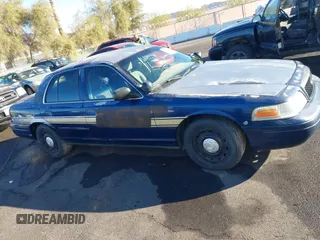 2004 Ford Police Interceptor Base w/3.27 Axle with VIN 2FAFP71W54X101274, listed as a IAAI auction lot 41164206 with 128,237 mi miles and . Bid and sale history available at DreamBid. Image 13.