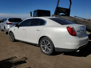 2009 Lincoln MKS with VIN 1LNHM94R59G611484, listed as a Copart auction lot 43998775 with 118,706 mi miles and Salvage Title. Bid and sale history available at DreamBid. Image 2.