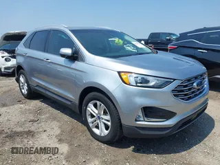 2020 Ford Edge SEL z VIN 2FMPK3J98LBA83828, wystawiony jako IAAI lot #42585669 z przebiegiem 60 704 mil mil oraz . Historia ofert i sprzedaży dostępna na DreamBid. Obrazek 1.