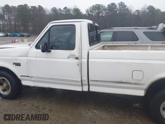 1994 Ford F-150 with VIN 1FTEF15N0RNA67826, listed as a IAAI auction lot 41547971 with 233,713 mi miles. Bid and sale history available at carsss.com. Image 15.