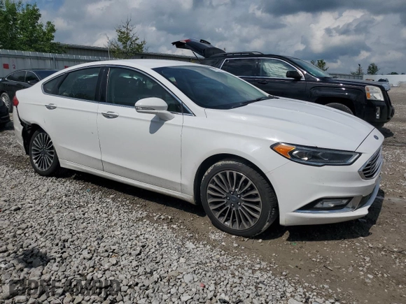 2017 Ford Fusion SE z VIN 3FA6P0H92HR203496, wystawiony jako Copart lot #56719365 z przebiegiem 99 817 mil mil oraz Szkoda całkowita • Salvage title. Historia ofert i sprzedaży dostępna na DreamBid. Obrazek 4.