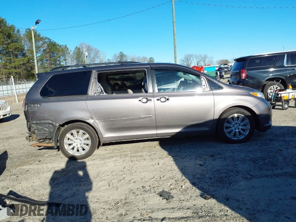 2011 Toyota Sienna XLE with VIN 5TDDK3DC8BS009739, listed as a IAAI auction lot 41638710 with 235,396 mi miles. Bid and sale history available at carsss.com. Image 13.
