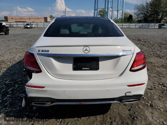 2019 Mercedes-Benz E 300 with VIN WDDZF4KB9KA520910, listed as a Copart auction lot 54697765 with 69,324 mi miles and Salvage title. Bid and sale history available at DreamBid. Image 6.