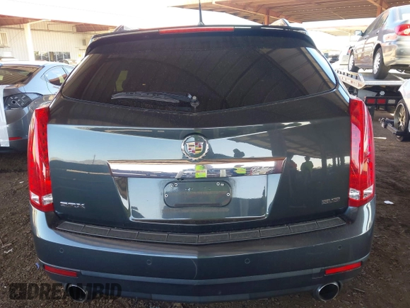 2014 Cadillac SRX Premium Collection z VIN 3GYFNDE31ES653114, wystawiony jako IAAI lot #42107858 z przebiegiem 125 192 mil mil oraz . Historia ofert i sprzedaży dostępna na DreamBid. Obrazek 16.