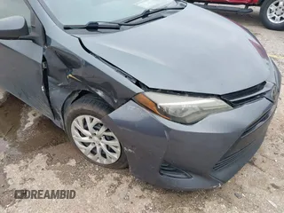 2018 Toyota Corolla L z VIN 5YFBURHE8JP762341, wystawiony jako IAAI lot #41616281 z przebiegiem 141 882 mil mil oraz . Historia ofert i sprzedaży dostępna na DreamBid. Obrazek 6.