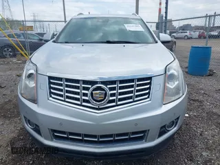 2013 Cadillac SRX Performance Collection z VIN 3GYFNDE35DS636363, wystawiony jako IAAI lot #42147483 z przebiegiem 116 894 mil mil oraz . Historia ofert i sprzedaży dostępna na DreamBid. Obrazek 12.