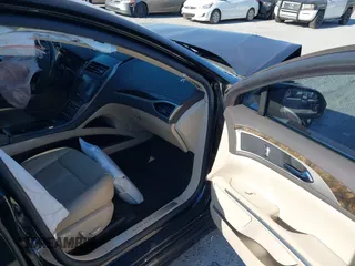 2016 Lincoln MKZ with VIN 3LN6L2G97GR624238, listed as a IAAI auction lot 41642853 with 205,832 mi miles. Bid and sale history available at carsss.com. Image 5.