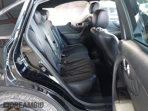 2016 Infiniti QX70 z VIN JN8CS1MW2GM752589, wystawiony jako IAAI lot #41826357 z przebiegiem 142 469 mil mil oraz . Historia ofert i sprzedaży dostępna na DreamBid. Obrazek 8.