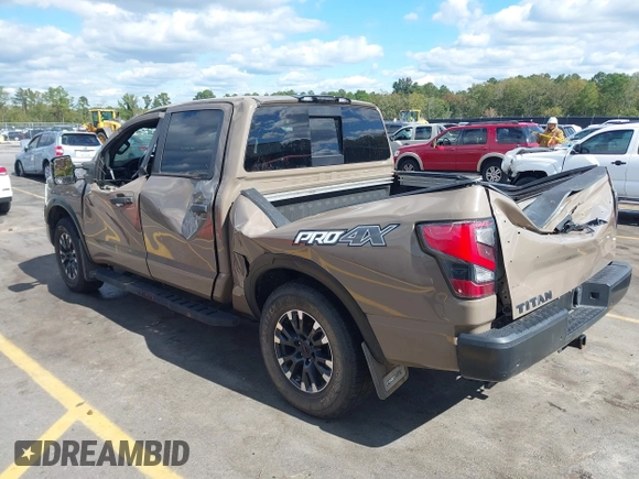 2021 Nissan Titan Pro-4X with VIN 1N6AA1ED4MN531369, listed as a IAAI auction lot 40597122 with 32,161 mi miles and . Bid and sale history available at DreamBid. Image 3.