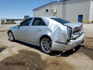 2012 Cadillac CTS Performance with VIN 1G6DK5E3XC0137143, listed as a Copart auction lot 53891815 with 123,174 mi miles and Salvage Title. Bid and sale history available at DreamBid. Image 2.