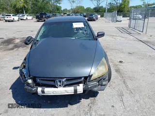2005 Honda Accord LX with VIN 1HGCM56465A045312, listed as a IAAI auction lot 42060427 with 151,467 mi miles and . Bid and sale history available at DreamBid. Image 12.