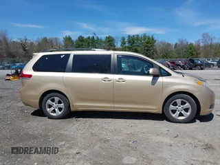 2012 Toyota Sienna LE AAS with VIN 5TDKK3DC9CS184090, listed as a IAAI auction lot 42123891 with 162,065 mi miles. Bid and sale history available at carsss.com. Image 13.