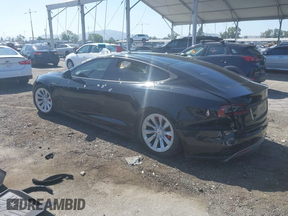 2014 Tesla Model S 60 z VIN 5YJSA1H13EFP42250, wystawiony jako IAAI lot #42267590 z przebiegiem 196 142 mil mil oraz . Historia ofert i sprzedaży dostępna na DreamBid. Obrazek 3.