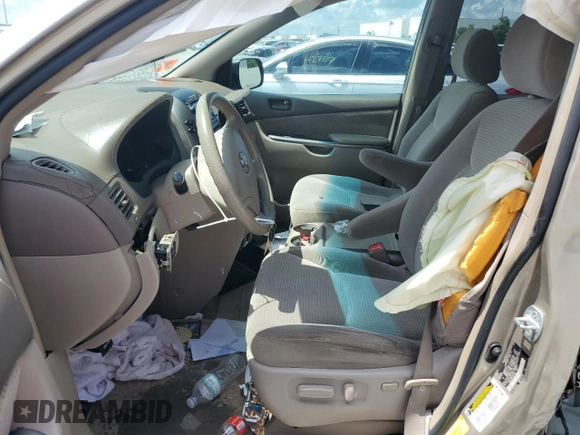 2006 Toyota Sienna CE с VIN 5TDZA23C26S501998, выставлен на аукционе Copart как лот 60785125 с пробегом 203 309 миль миль и Списание • Salvage title. История ставок и продаж доступна на DreamBid. Изображение 7.