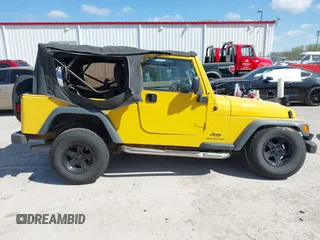 2004 Jeep Wrangler Sport with VIN 1J4FA49S64P759360, listed as a IAAI auction lot 42028277 with 176,880 mi miles and . Bid and sale history available at DreamBid. Image 14.