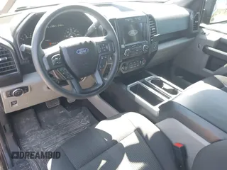 2019 Ford F-150 XL with VIN 1FTEW1E4XKKE93960, listed as a IAAI auction lot 42063323 with 177,650 mi miles and . Bid and sale history available at DreamBid. Image 12.