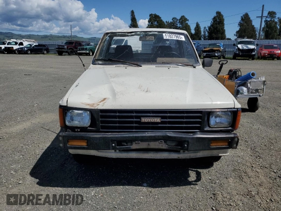 1985 Toyota Pickup z VIN JT4RN50R4F0068265, wystawiony jako Copart lot #51827965 z przebiegiem 348 047 mil mil oraz Szkoda całkowita • Salvage title. Historia ofert i sprzedaży dostępna na DreamBid. Obrazek 5.