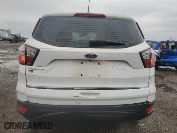 2018 Ford Escape S с VIN 1FMCU0F79JUA66123, выставлен на аукционе Copart как лот 51492995 с пробегом 81 905 миль миль и Списание • Salvage title. История ставок и продаж доступна на DreamBid. Изображение 6.