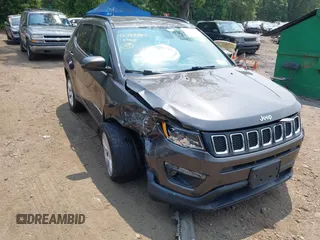 2019 Jeep Compass Altitude with VIN 3C4NJDBB1KT734970, listed as a IAAI auction lot 42483357 with 59,425 mi miles and . Bid and sale history available at DreamBid. Image 6.