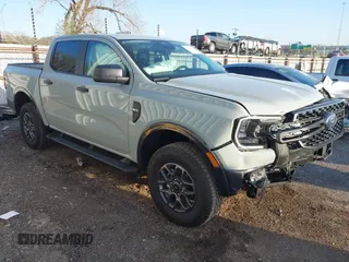 2024 Ford Ranger XLT z VIN 1FTER4GHXRLE59319, wystawiony jako IAAI lot #41990936 z przebiegiem 1 002 mil mil oraz . Historia ofert i sprzedaży dostępna na DreamBid. Obrazek 1.