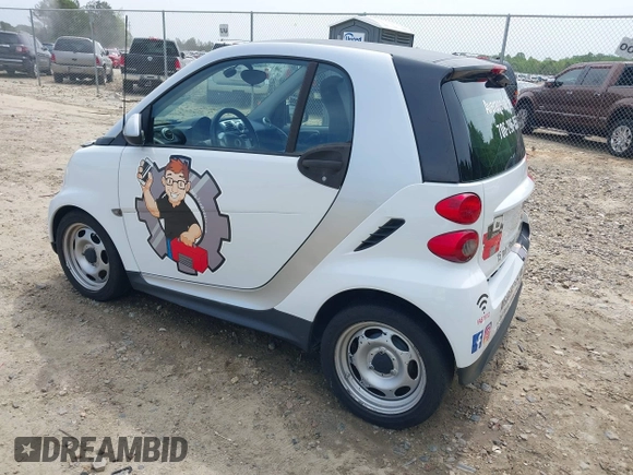 2014 Smart fortwo Pure with VIN WMEEJ3BA2EK733819, listed as a IAAI auction lot 42041305 with 69,018 mi miles and . Bid and sale history available at DreamBid. Image 3.