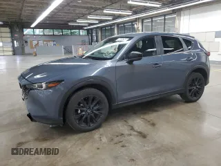 2024 Mazda CX-5 S Carbon Edition z VIN JM3KFBCLXR0511857, wystawiony jako Copart lot #60535765 z przebiegiem 25 987 mil mil oraz Czysty tytuł • Clean title. Historia ofert i sprzedaży dostępna na DreamBid. Obrazek 1.