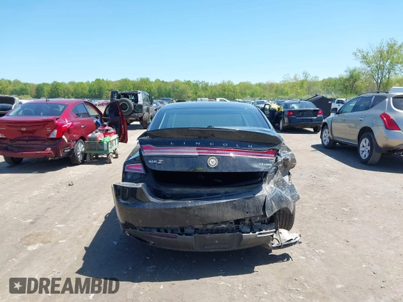 2015 Lincoln MKZ with VIN 3LN6L2J96FR625761, listed as a IAAI auction lot 42235387 with 132,183 mi miles and . Bid and sale history available at DreamBid. Image 16.