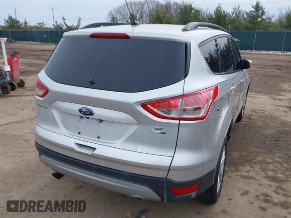 2016 Ford Escape SE with VIN 1FMCU9G94GUC06902, listed as a IAAI auction lot 41432640 with 200,575 mi miles. Bid and sale history available at carsss.com. Image 4.