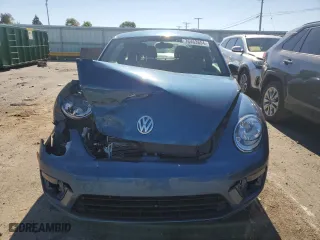 2019 Volkswagen Beetle S with VIN 3VWFD7AT3KM720132, listed as a Copart auction lot 76463854 with 123,163 mi miles and Salvage Title. Bid and sale history available at carsss.com. Image 5.