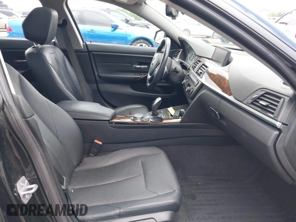 2015 BMW 4 Series 428i xDrive with VIN WBA4C9C52FD331620, listed as a IAAI auction lot 42556526 with 115,674 mi miles and . Bid and sale history available at DreamBid. Image 5.