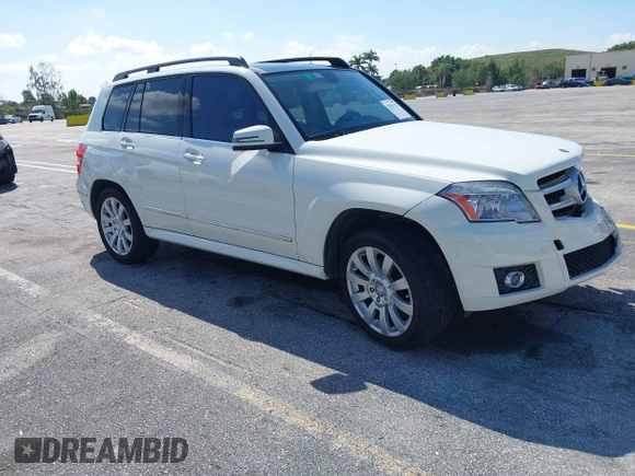 2012 Mercedes-Benz GLK GLK 350 with VIN WDCGG5GB8CF735979, listed as a IAAI auction lot 41931333 with 124,649 mi miles. Bid and sale history available at carsss.com. Image 1.