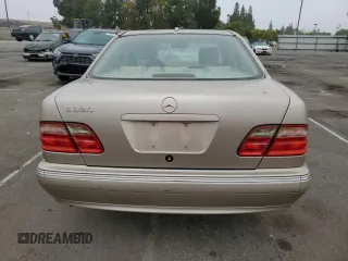 2002 Mercedes-Benz E-Class with VIN WDBJF65J92B404315, listed as a Copart auction lot 75481094 with 87,383 mi miles and Salvage Title. Bid and sale history available at carsss.com. Image 6.