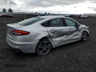 2019 Ford Fusion Titanium with VIN 3FA6P0D99KR242616, listed as a Copart auction lot 57525635 with 79,518 mi miles and Salvage title. Bid and sale history available at DreamBid. Image 3.