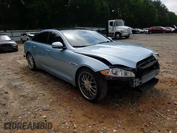 2013 Jaguar XJ with VIN SAJWA1C77D8V41738, listed as a Copart auction lot 53796225 with 104,063 mi miles and Salvage Title. Bid and sale history available at DreamBid. Image 14.
