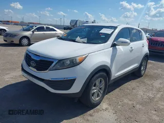 2011 Kia Sportage LX with VIN KNDPB3A26B7114119, listed as a IAAI auction lot 42105997 with 186,432 mi miles and . Bid and sale history available at carsss.com. Image 2.