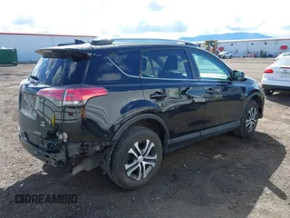 2018 Toyota RAV4 LE with VIN 2T3BFREV2JW749735, listed as a IAAI auction lot 41998068 with 112,468 mi miles. Bid and sale history available at carsss.com. Image 4.