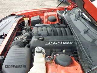 2016 Dodge Challenger SRT 392 с VIN 2C3CDZDJ1GH345203, выставлен на аукционе IAAI как лот 43025317 с пробегом 70 069 миль миль и . История ставок и продаж доступна на DreamBid. Изображение 21.