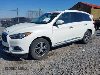 2016 Infiniti QX60 with VIN 5N1AL0MM9GC514586, listed as a IAAI auction lot 41861058 with 151,741 mi miles. Bid and sale history available at carsss.com. Image 2.